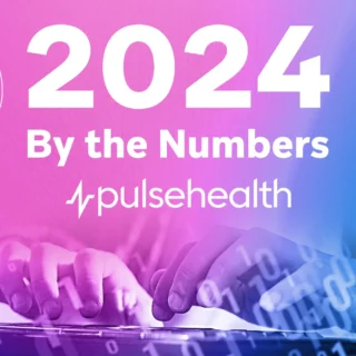 Hands typing on a laptop with a floating binary code overlay on a pink-blue gradient and the text “2024 By the Numbers” with the Pulse Health logo.