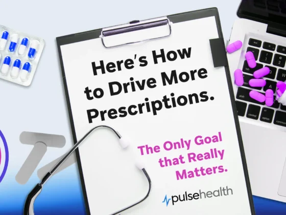 An overhead shot shows a clipboard on a pale blue gradient surface bearing the bold headline “Here’s How to Drive More Prescriptions,” surrounded by scattered purple capsules, a laptop keyboard edge, and a stethoscope.