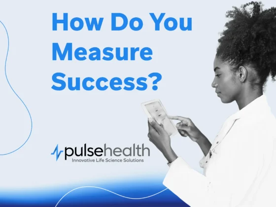 Professional in a lab coat using a tablet against a light blue background with the text “How Do You Measure Success?” and the Pulse Health logo.