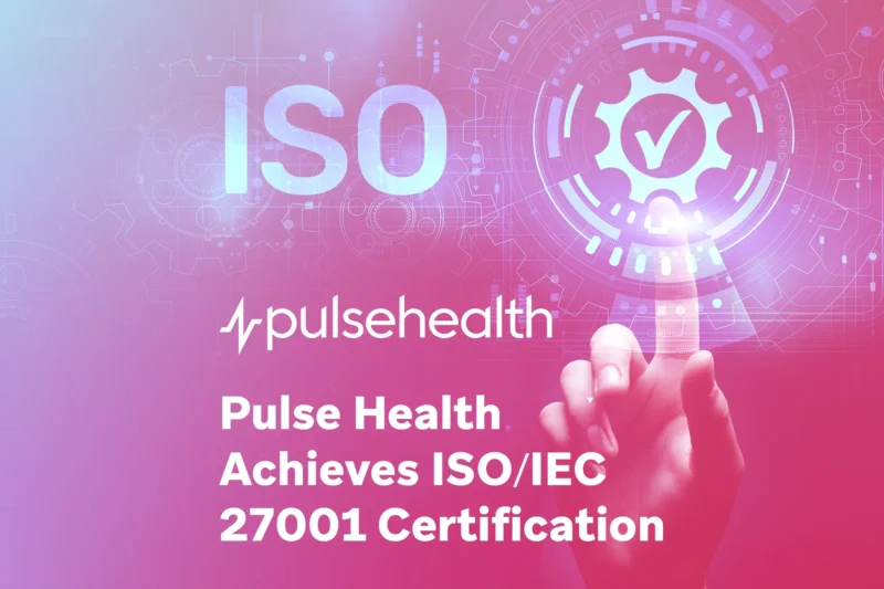 Finger touching a glowing gear icon with a checkmark overlay on a pink-to-purple gradient, plus the Pulse Health logo and the text “Pulse Health Achieves ISO/IEC 27001 Certification.”